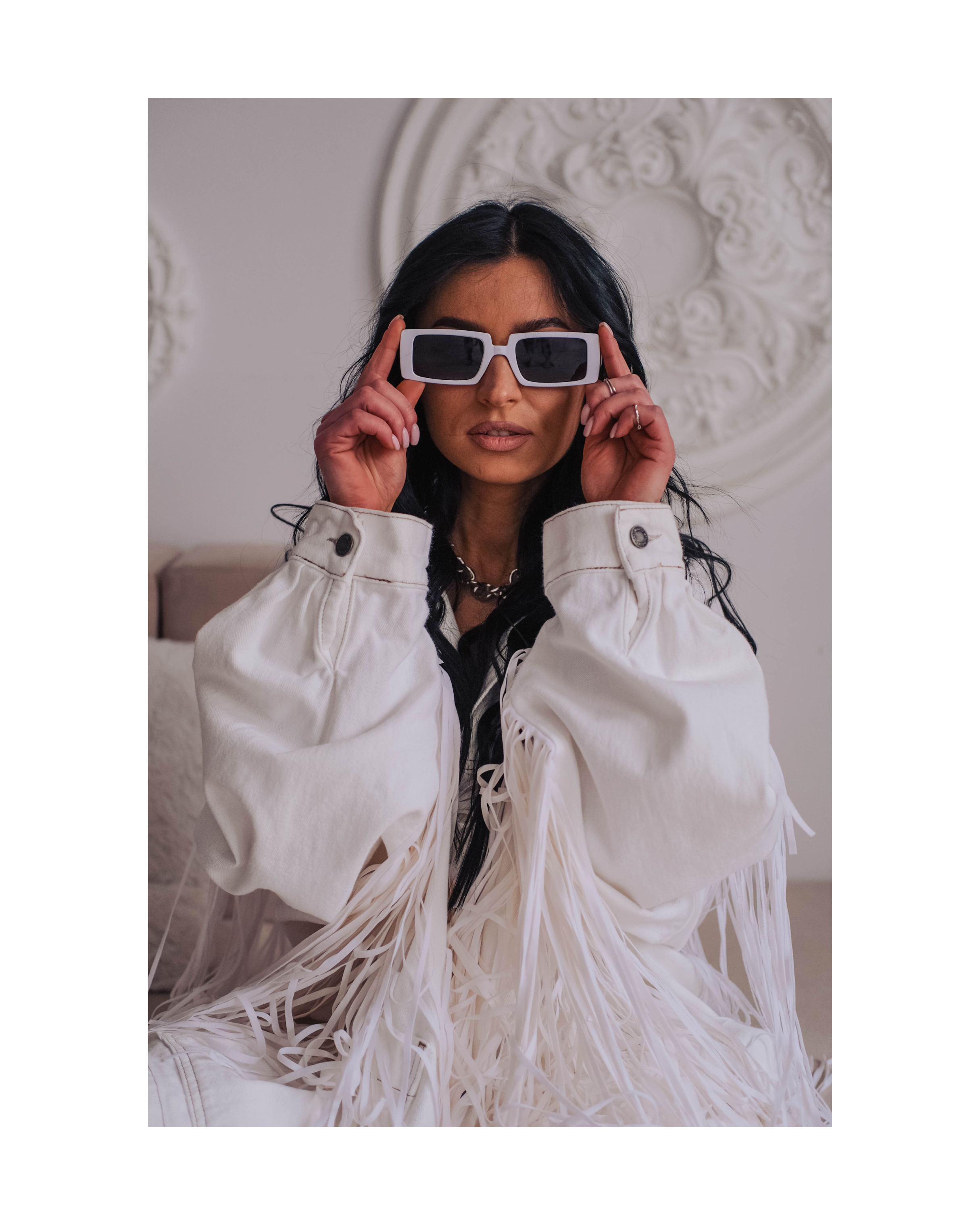 Fashion creator wearing modern sunglasses